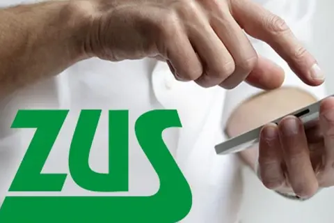 Dłonie trzymające smartfon na tle logo ZUS. Temat: umowa zlecenie a ciąża.